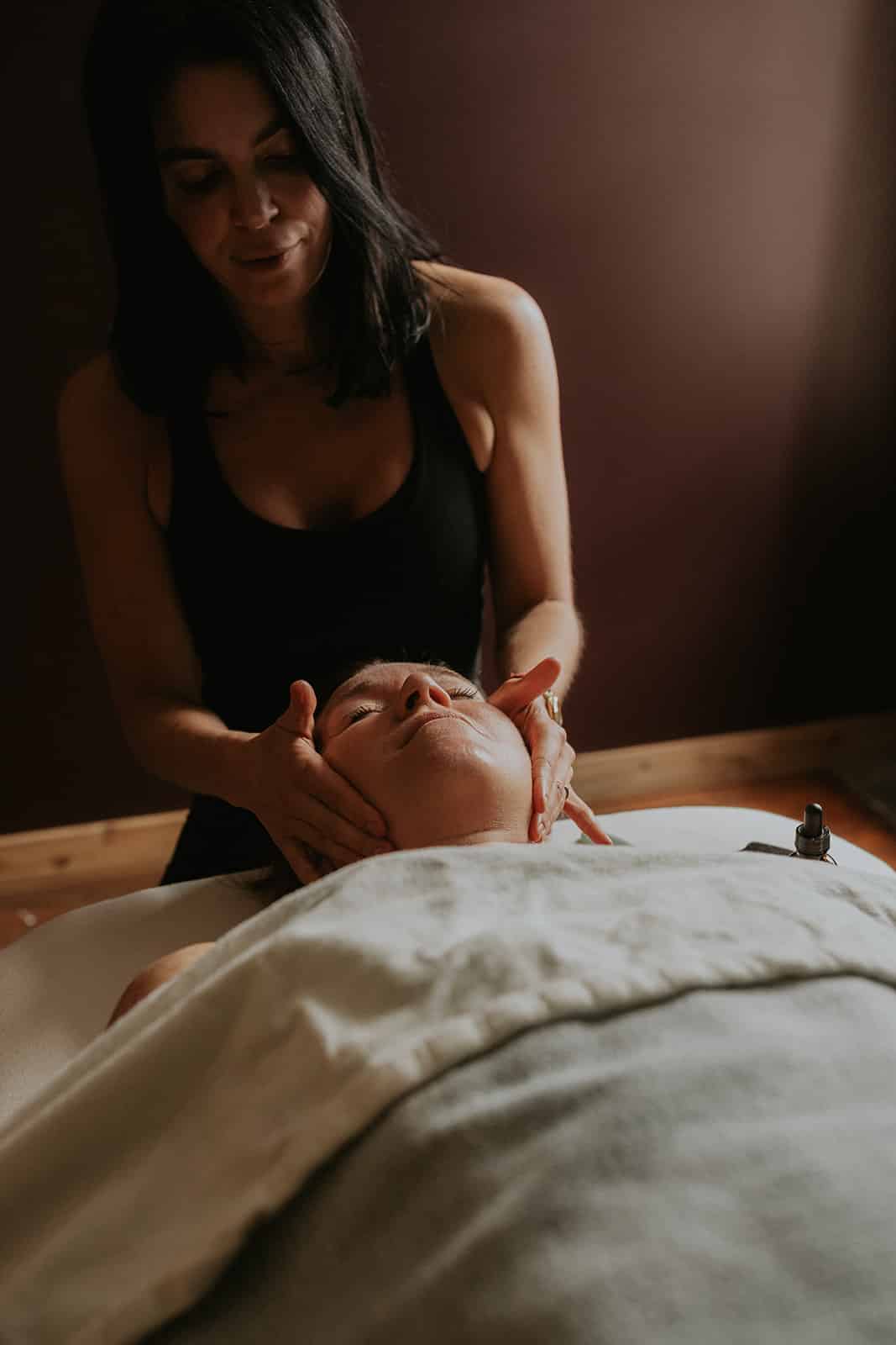 Registered Massage Therapist Providing Head Massage for Stress Relief
