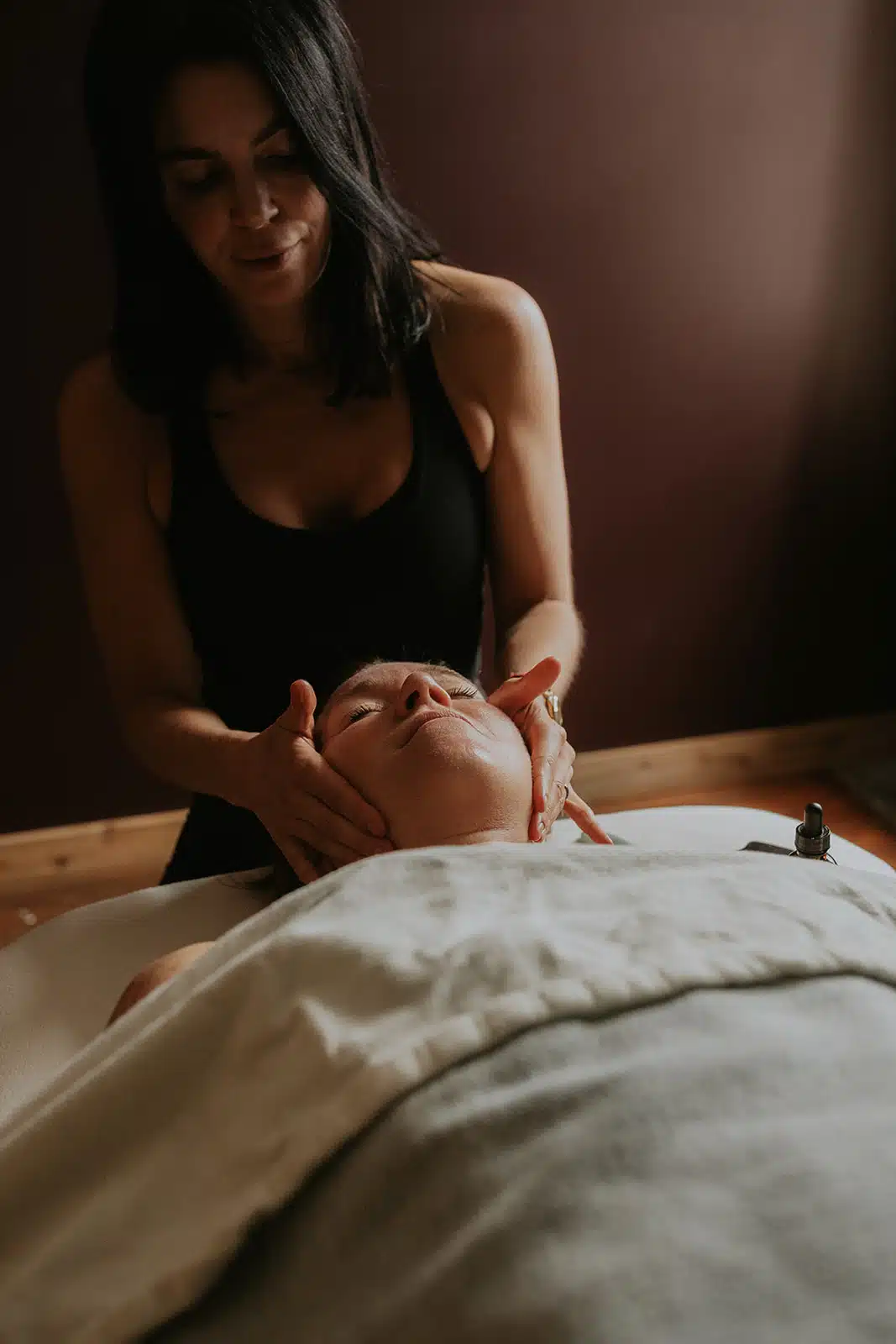 Therapeutic Head Massage in Action Registered Massage Therapist Providing Head Massage for Stress Relief